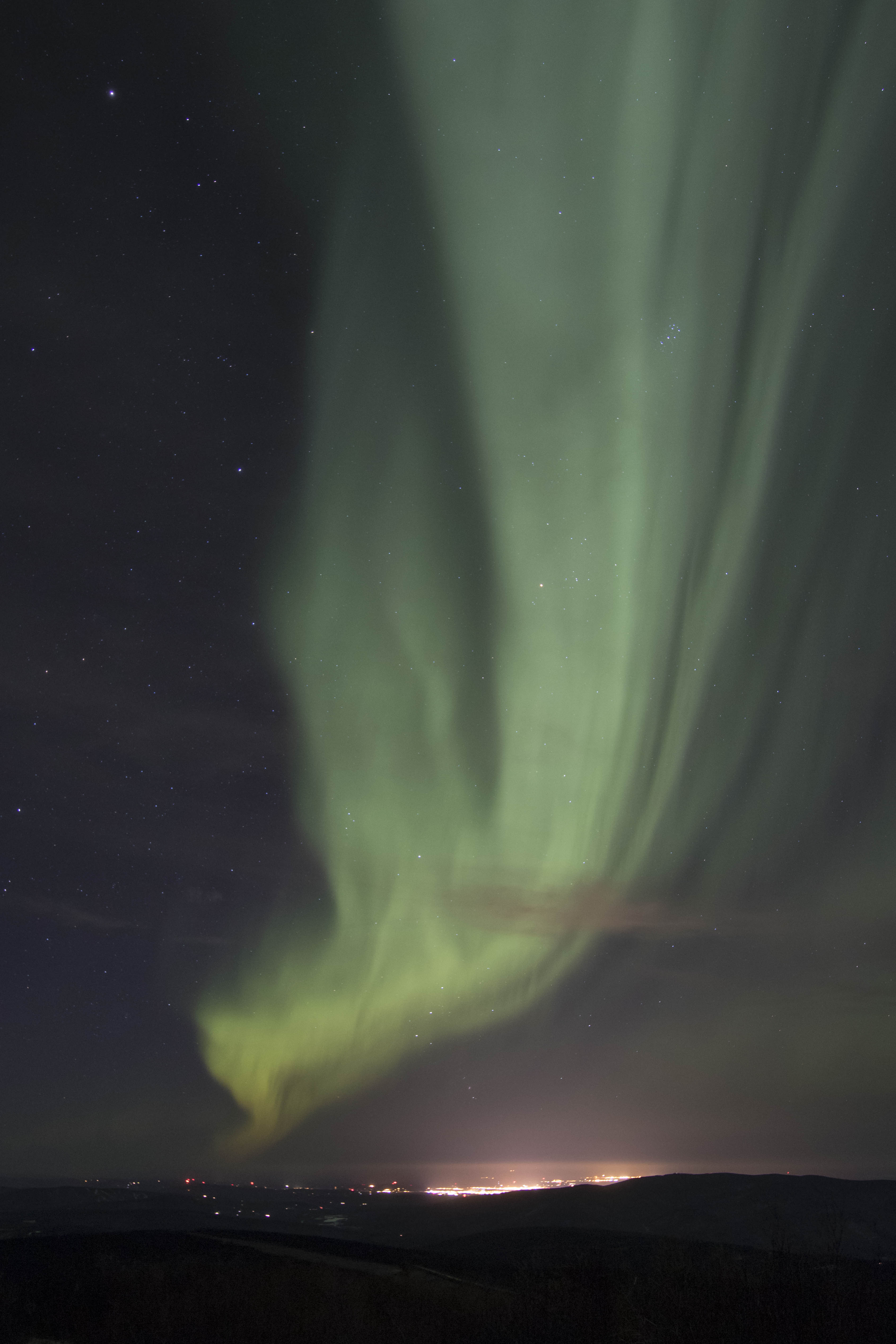 Aurora over the city of
                Fairbanks, Alaska