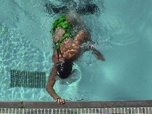 Swimmer touching wall