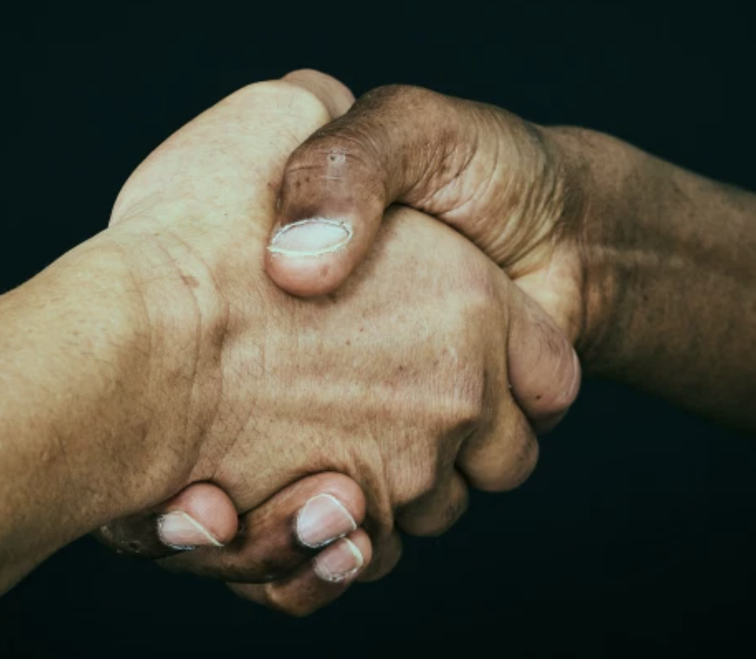 two people
                  holding hands