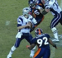Tom Brady getting tackled
