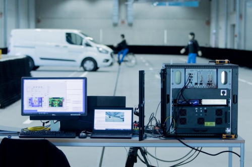 Image of
                            a Computer System Monitoring LiDAR Data for
                            the Vehicle In Front of It.